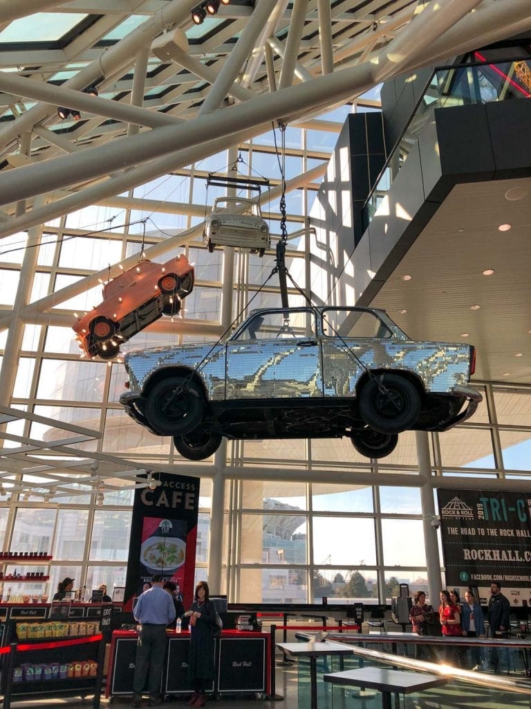 Cars hanging in the Rock and Roll Hall of Fame lobby
