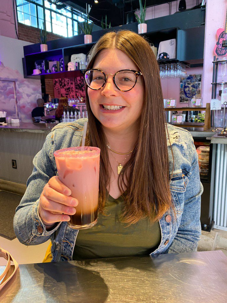 Amanda with a 27 Club pink latte