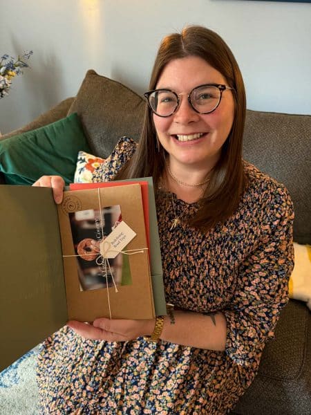 Amanda with a Guess Where Trips packet