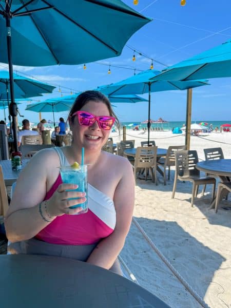 Amanda with a drink at The Sandbar